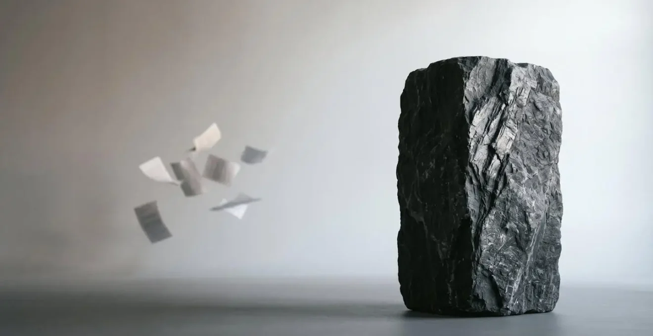 Conceptual representation of blockchain immutability versus traditional banking reconciliation through contrasting physical metaphors of permanence and revision